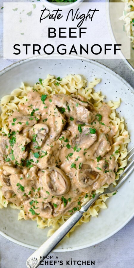 Pinterest graphic for Date Night Beef Stroganoff showing one serving in a dinner bowl.