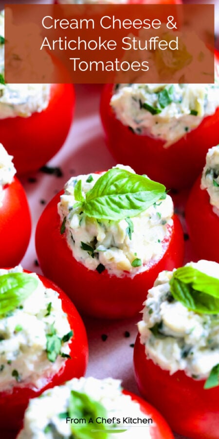 Pinterest graphic for Cream Cheese and Artichoke Stuffed Tomatoes showing them garnished with small fresh basil leaves.