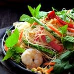 Vietnamese Spring Roll Salad on black plate.