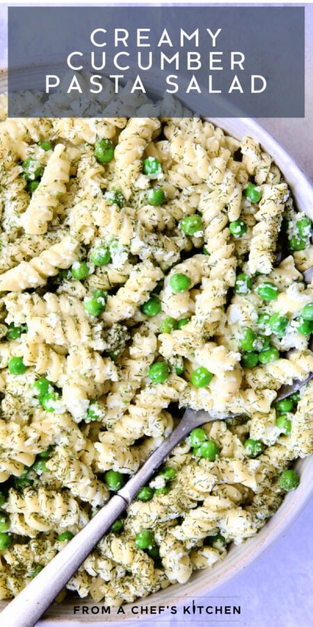 Pinterest graphic for Creamy Cucumber Pasta Salad showing it in a white serving bowl with serving spoon.