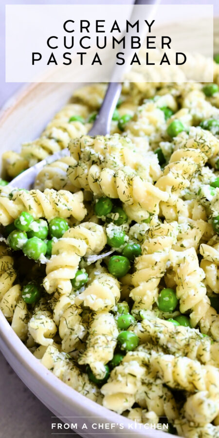 Pinterest graphic for Creamy Cucumber Pasta Salad showing it in a white serving bowl with serving spoon.