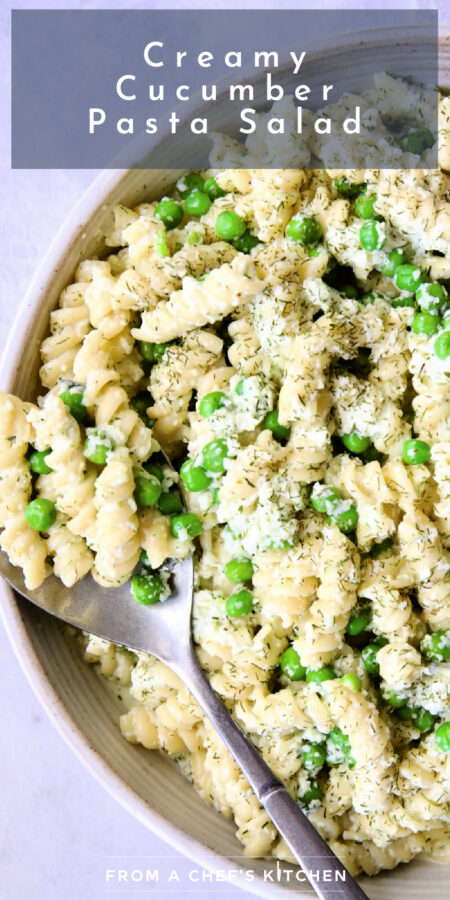 Pinterest graphic for Creamy Cucumber Pasta Salad showing it in a white serving bowl with serving spoon.