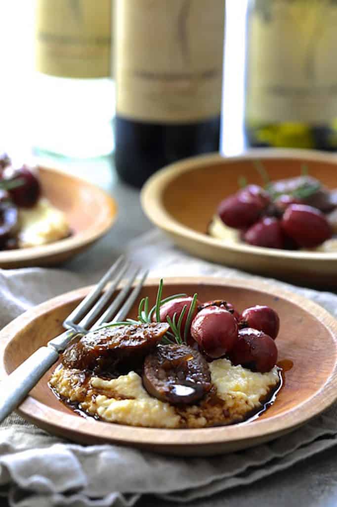 Balsamic Italian Sausage and Grapes over Goat Cheese Polenta
