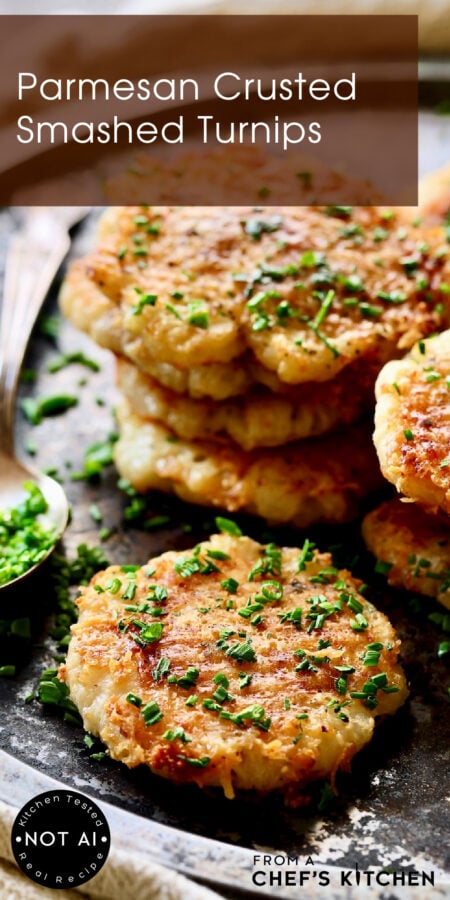 Pinterest graphic for Parmesan Crusted Smashed Turnips showing them stacked on a vintage platter.