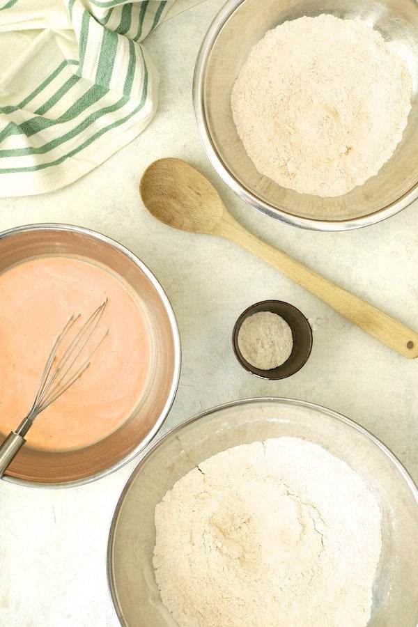 Photo of the set-up for battering the chicken with flour and buttermilk.