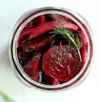 Quick Pickled Beets with Dill in glass jar with fresh dill.