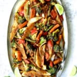 Curried Roast Vegetables on oval gray platter.