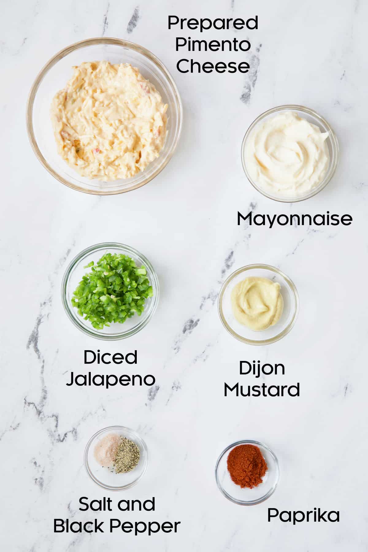 Filling ingredients for Jalapeno Pimento Cheese Deviled Eggs.