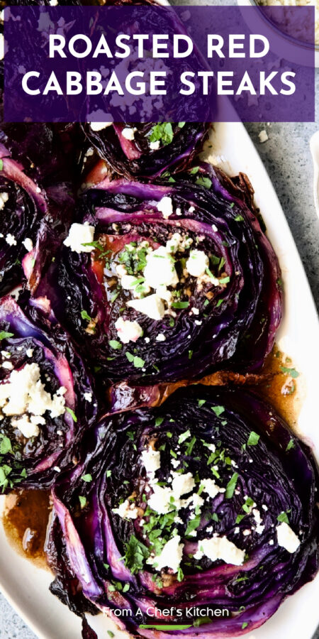 Pinterest graphic for Roasted Red Cabbage Steaks showing them on a white platter sprinkled with goat cheese.