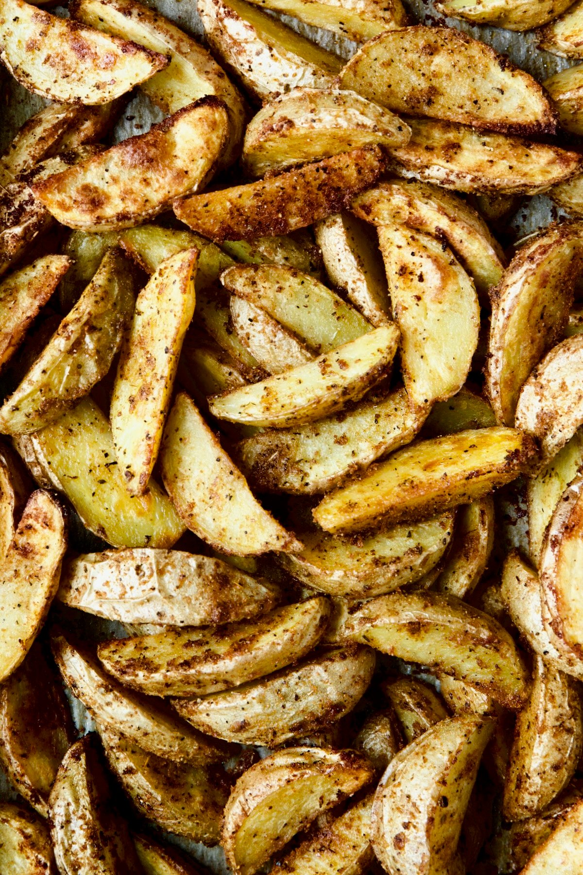 Photo of roasted potato wedges.