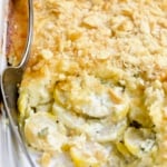 Southwestern Summer Squash Casserole in white baking dish with squash exposed.