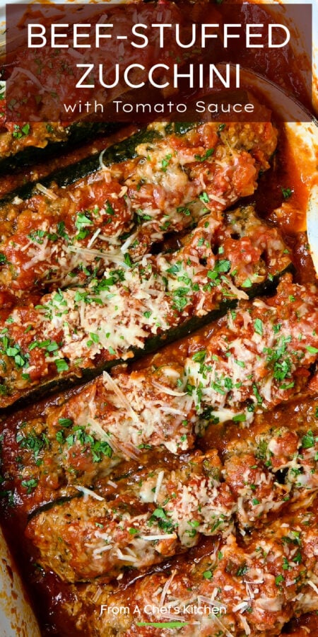 Pinterest graphic for Beef-Stuffed Zucchini showing six lined up in a white baking dish.