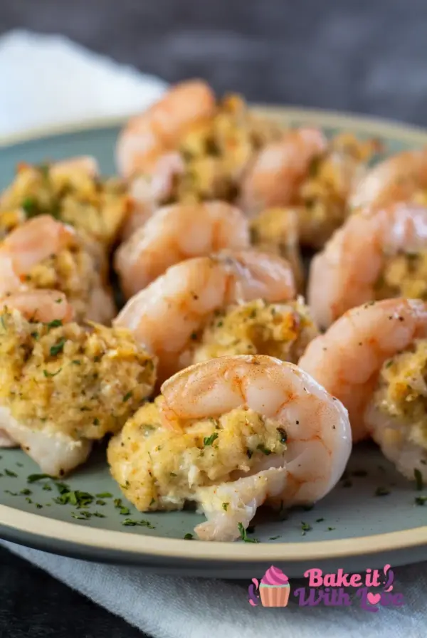 Crab-Stuffed Shrimp on green plate garnished with fresh parsley.