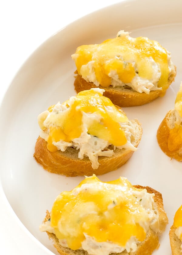 Crab Toast on white plate.