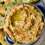 Artichoke Tapenade in blue bowl.