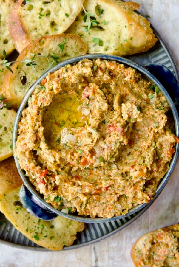 Artichoke Tapenade in blue bowl.