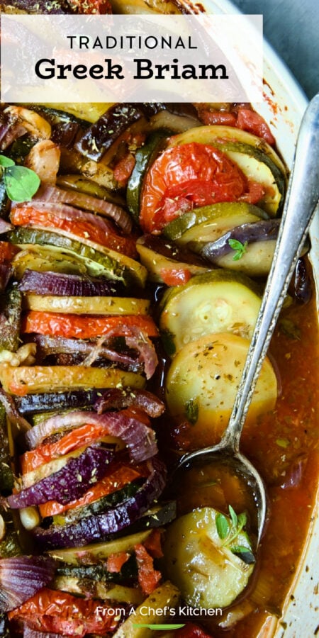 Pinterest graphic for Traditional Briam (Greek Roasted Vegetables) showing them in an oval white baking dish with serving spoon.