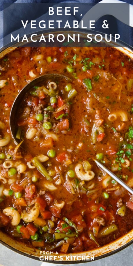 Pinterest graphic for Beef Vegetable and Macaroni Soup showing it in a white Dutch oven with soup ladle.