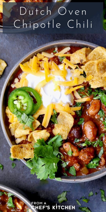 Pinterest graphic for Dutch Oven Chili showing one serving in a gray bowl.