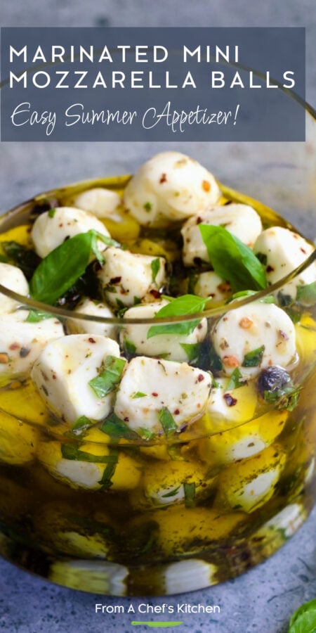 Pinterest graphic for Marinated Mozzarella Balls showing them in a glass jar garnished with fresh basil.
