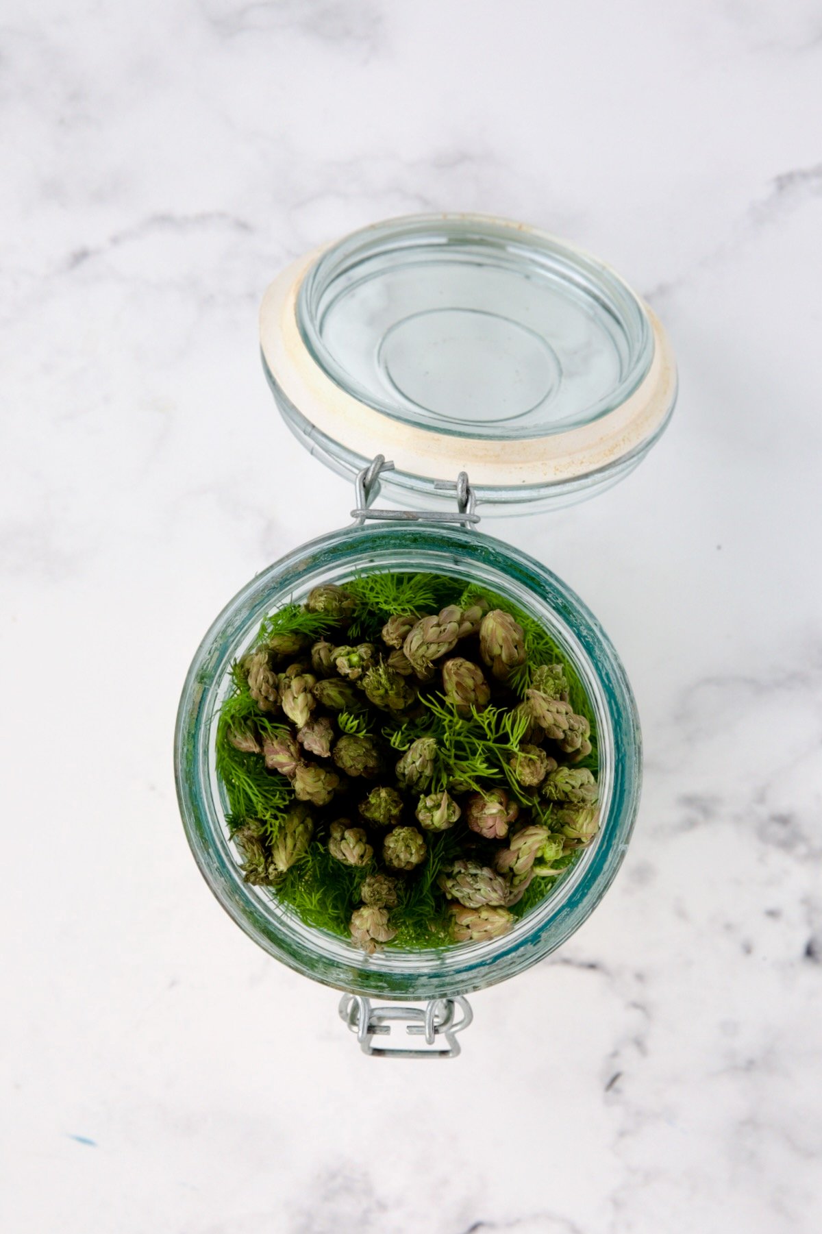 Asparagus in glass jar.