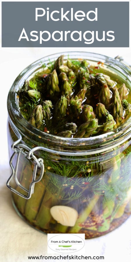 Pinterest graphic for Pickled Asparagus showing it in a glass jar.