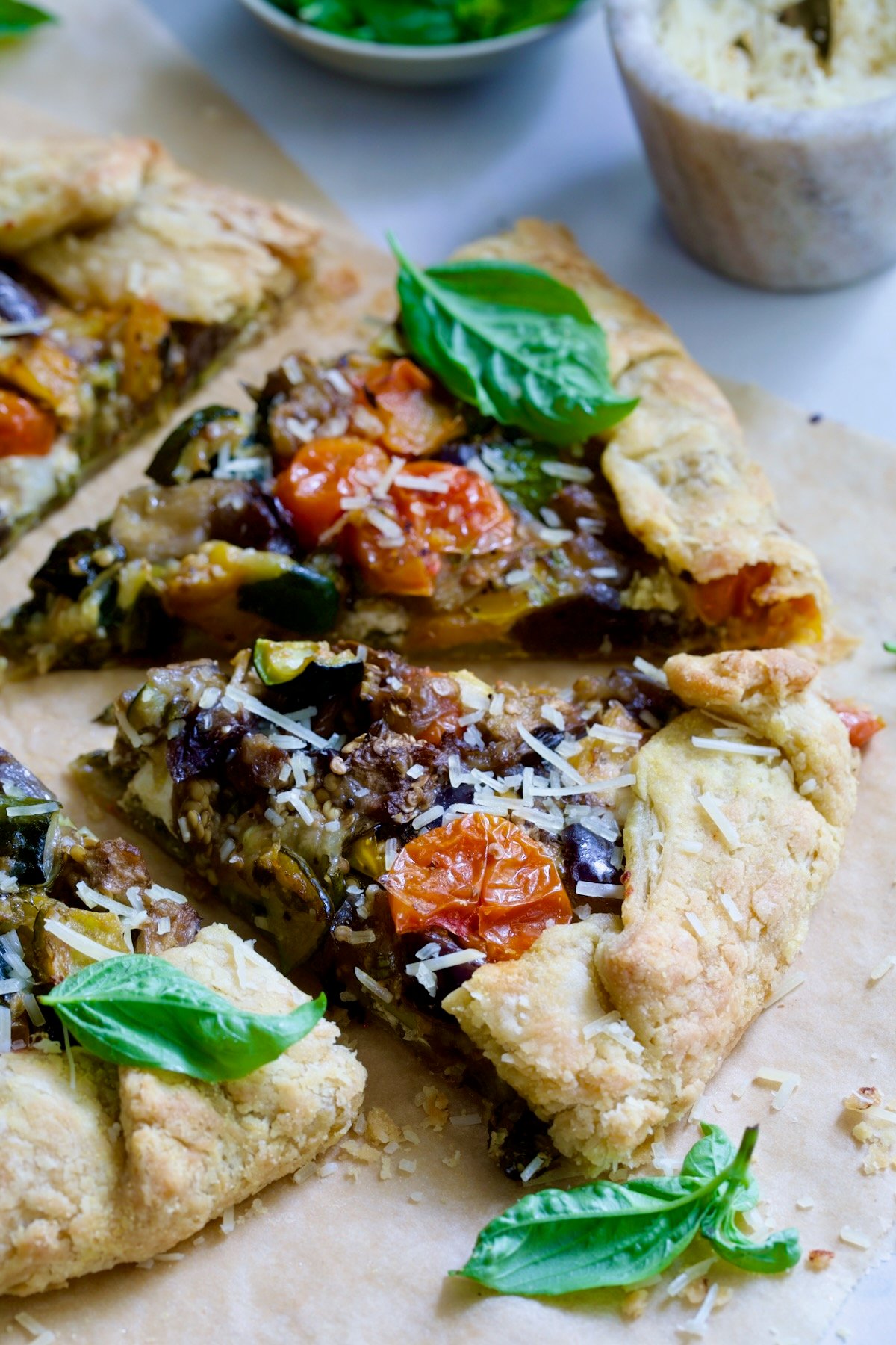 Two wedges of Mediterranean Vegetable Galette.