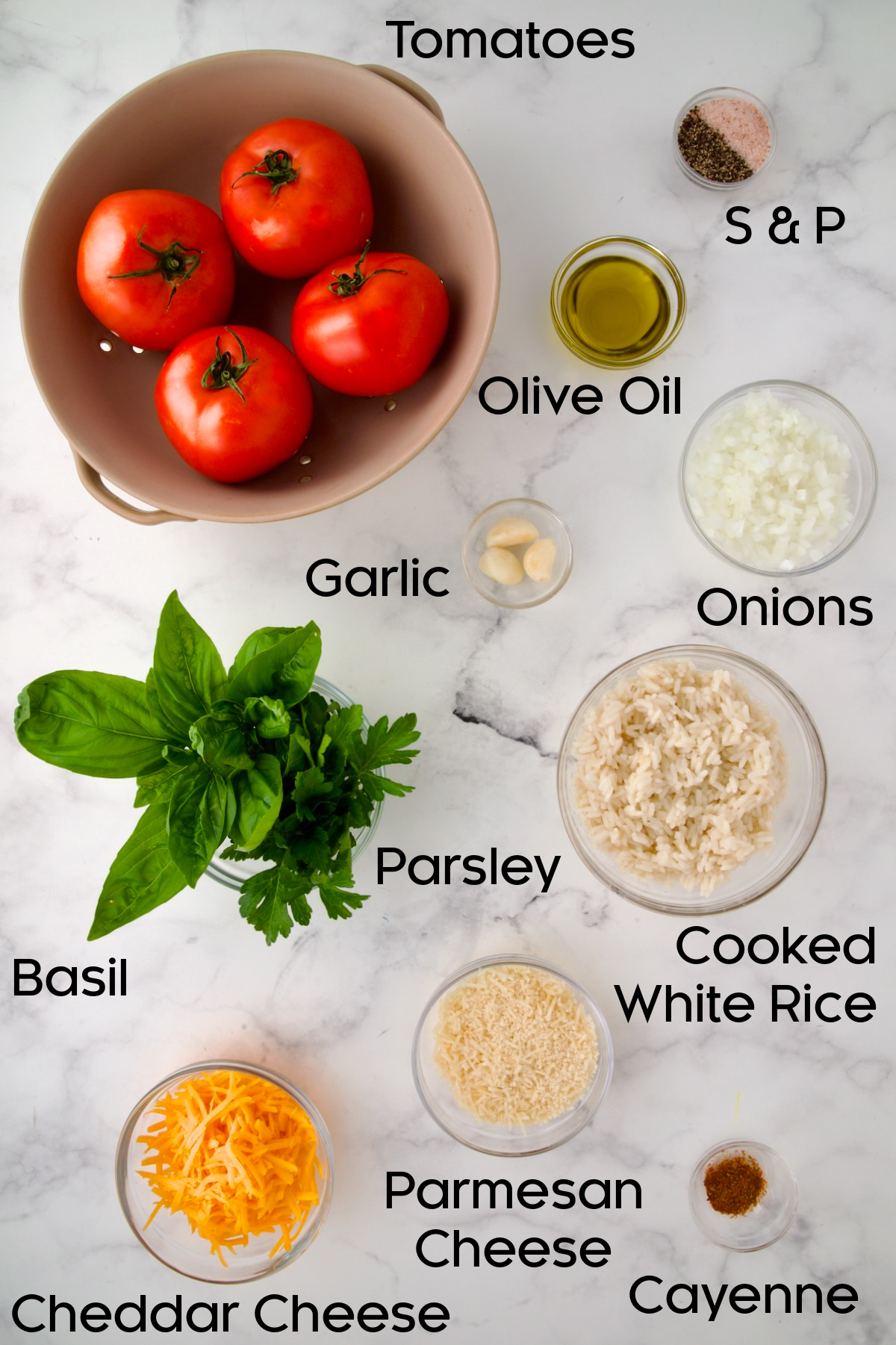 Ingredients for Cheesy Rice Stuffed Tomatoes Recipe in glass bowls.