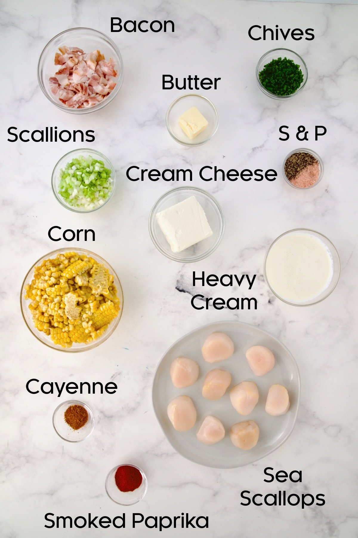 Ingredients for Seared Sea Scallops with Smoky Sweet Corn Puree in glass bowls.