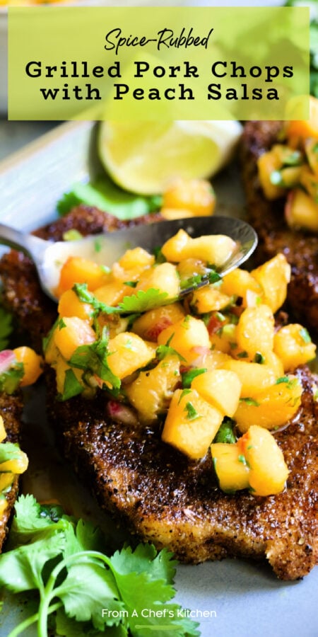 Pinterest graphic for Grilled Pork Chops with Peach Salsa showing them on a gray oval platter with spoon.