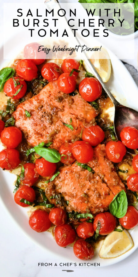 Pinterest graphic for Salmon with Cherry Tomatoes showing it on an oval white platter with basil and lemon wedges.
