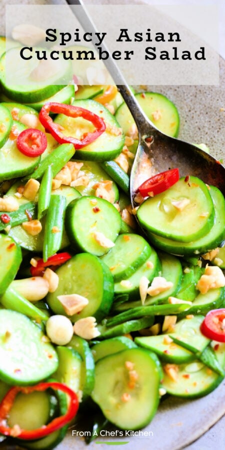 Pinterest graphic for Spicy Asian Cucumber Salad showing it in an earthenware bowl with serving spoon.
