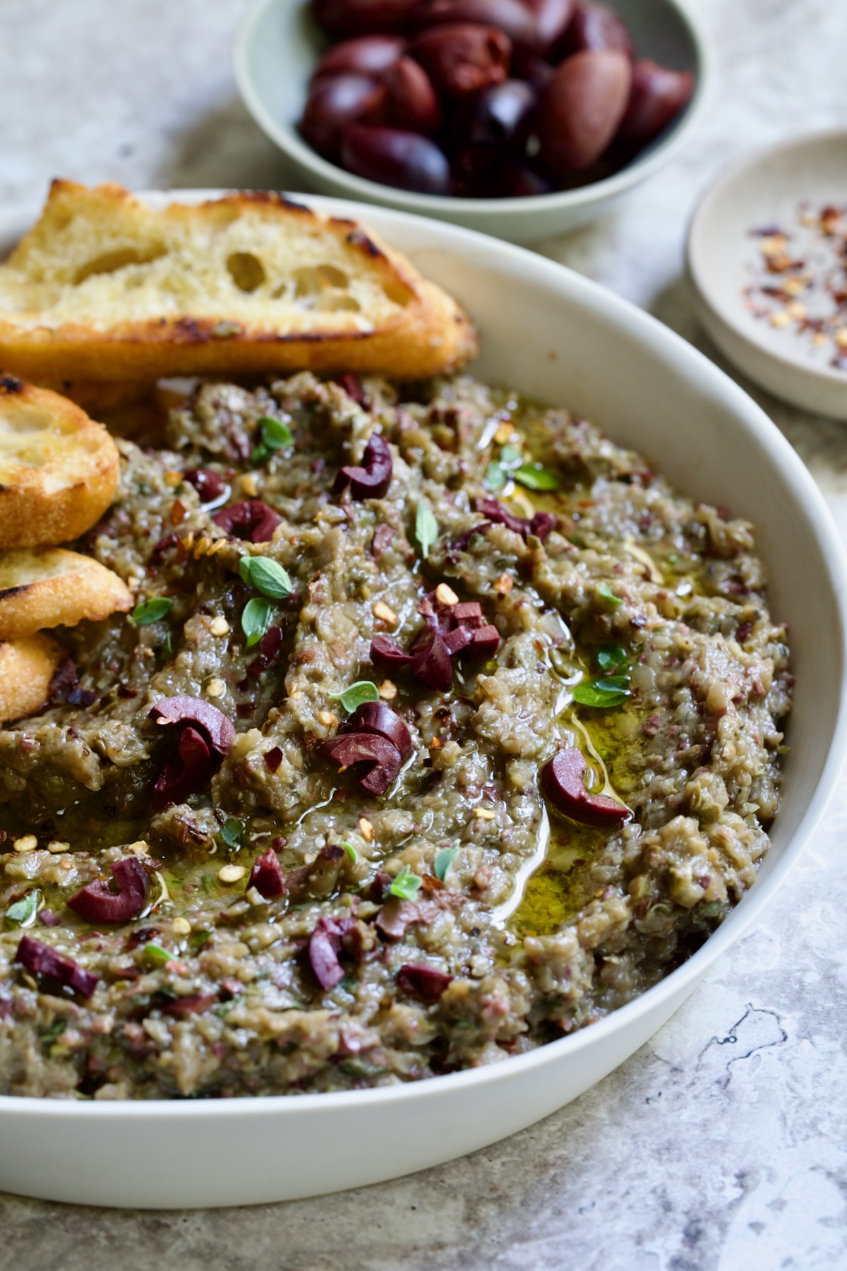 Eggplant Caviar (Caviar d'Aubergine) in white bowl.
