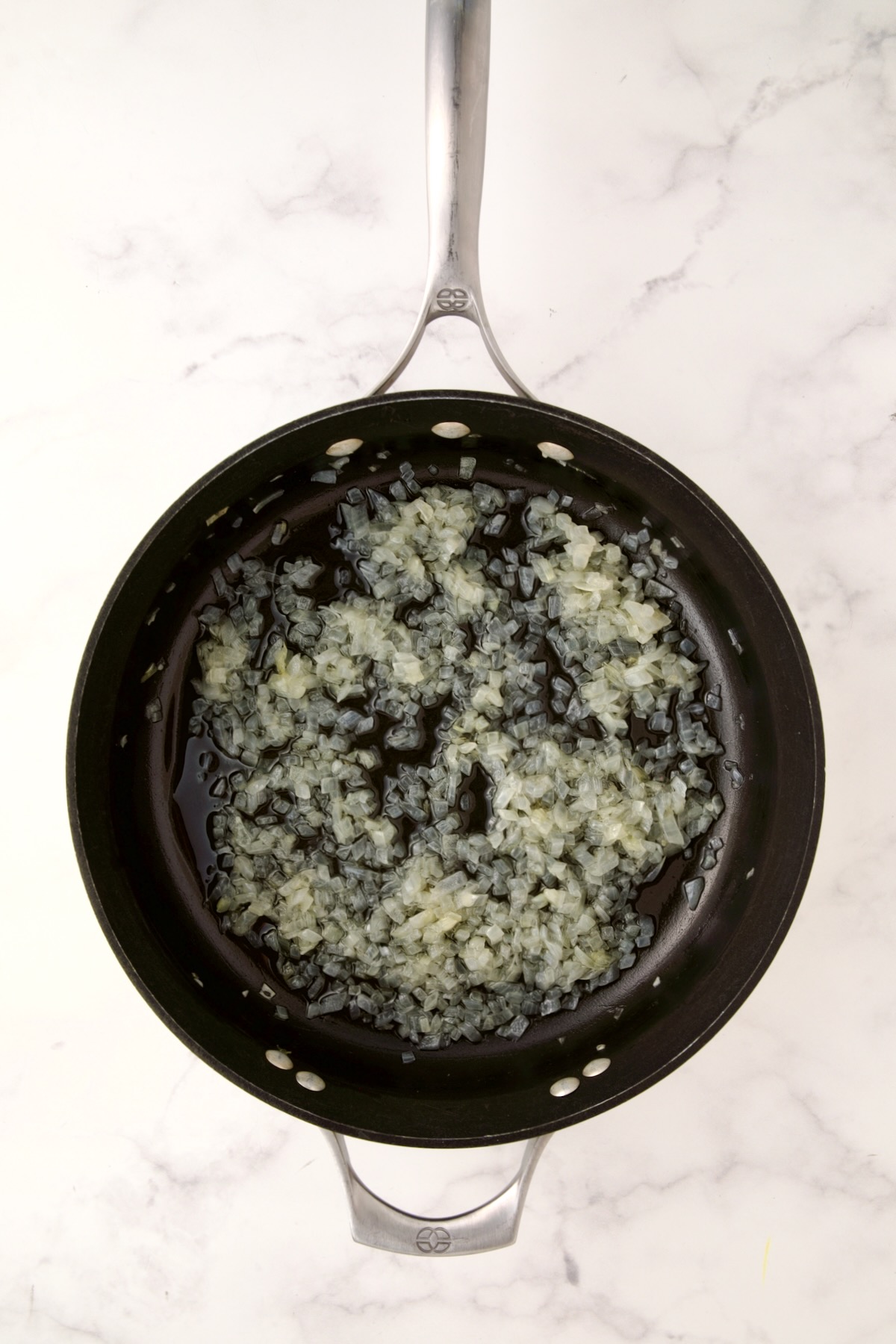 Softened onions in nonstick skillet.