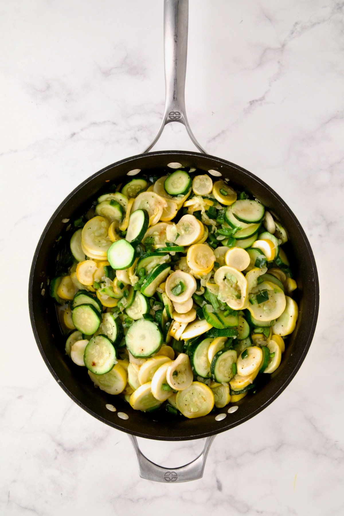 Cooked zucchini, yellow squash and poblano in nonstick skillet.