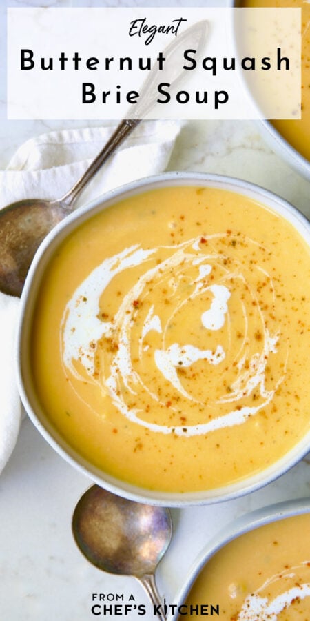 Pinterest graphic for Butternut Squash Brie Soup showing one serving in a white bowl.