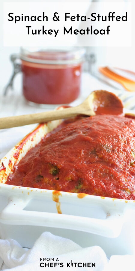 Pinterest graphic for Spinach and Feta-Stuffed Turkey Meatloaf showing the whole loaf in a white loaf pan.