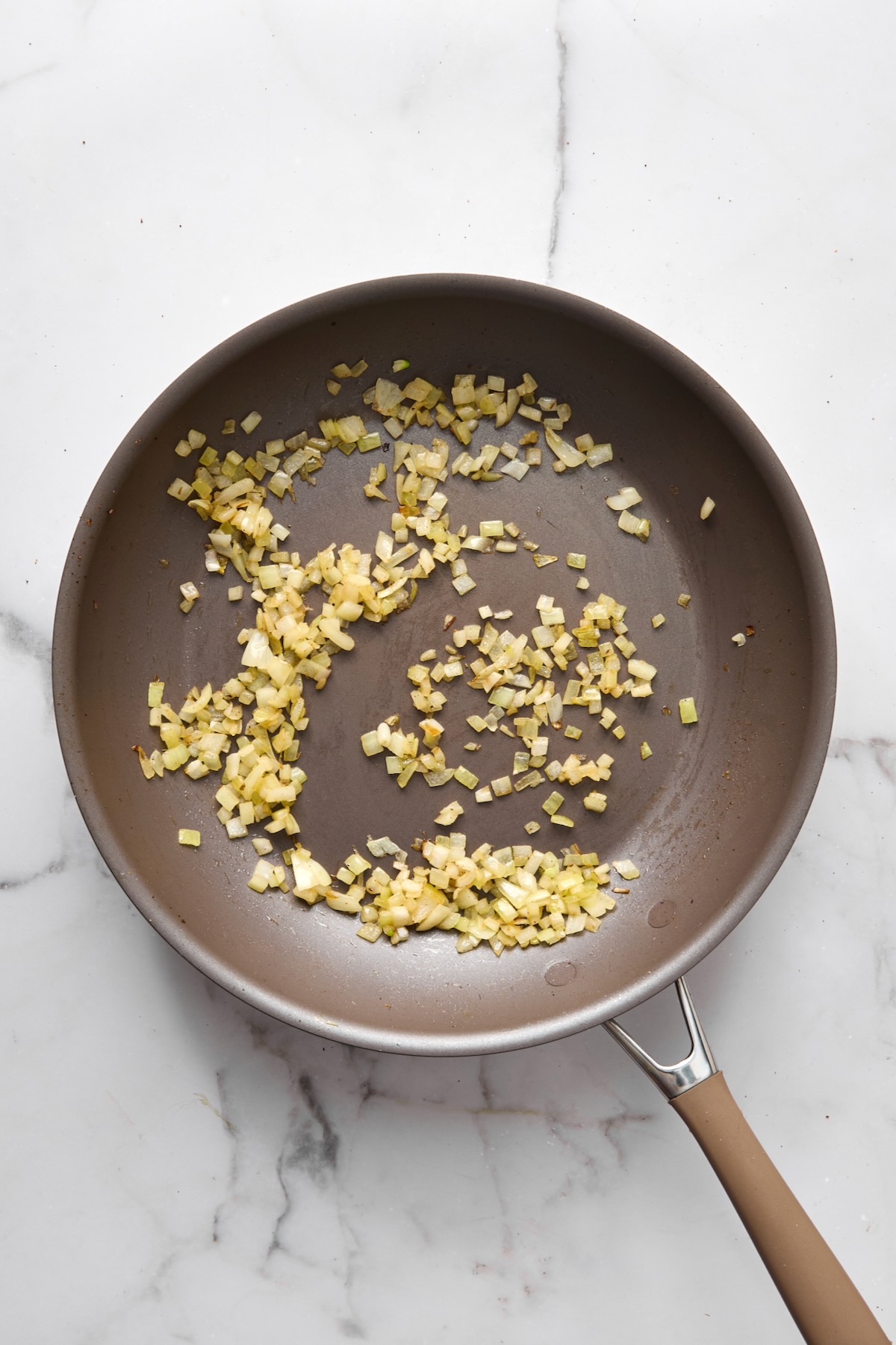 Cooked onions in nonstick skillet.