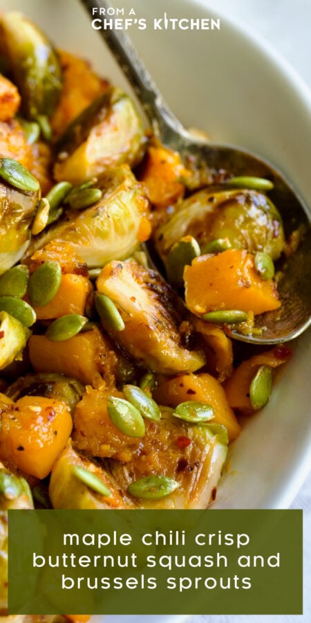 Pinterest graphic for Maple Chili Crips Brussels Sprouts Butternut Squash showing it in a white serving bowl with serving spoon.