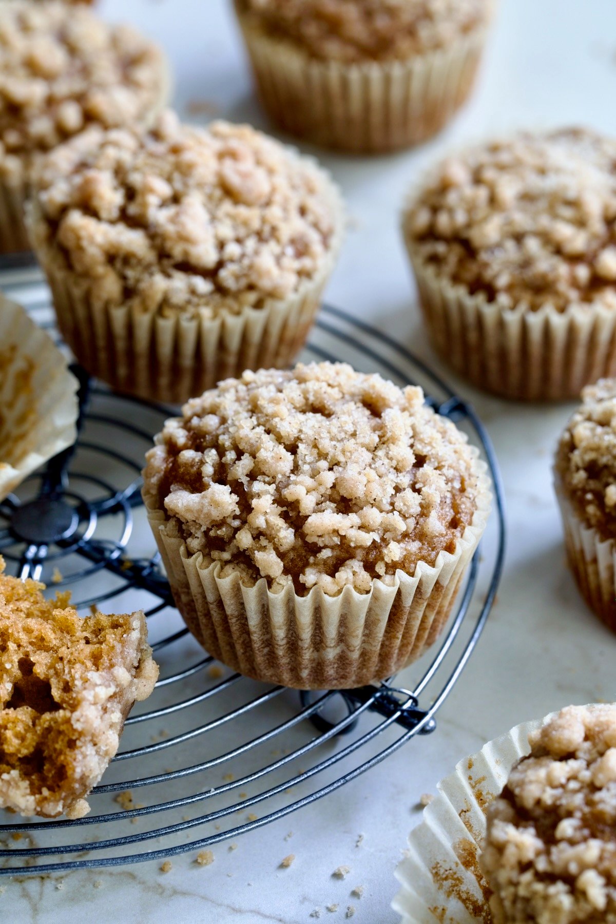 Pumpkin Streusel Muffins on round cooling rack.