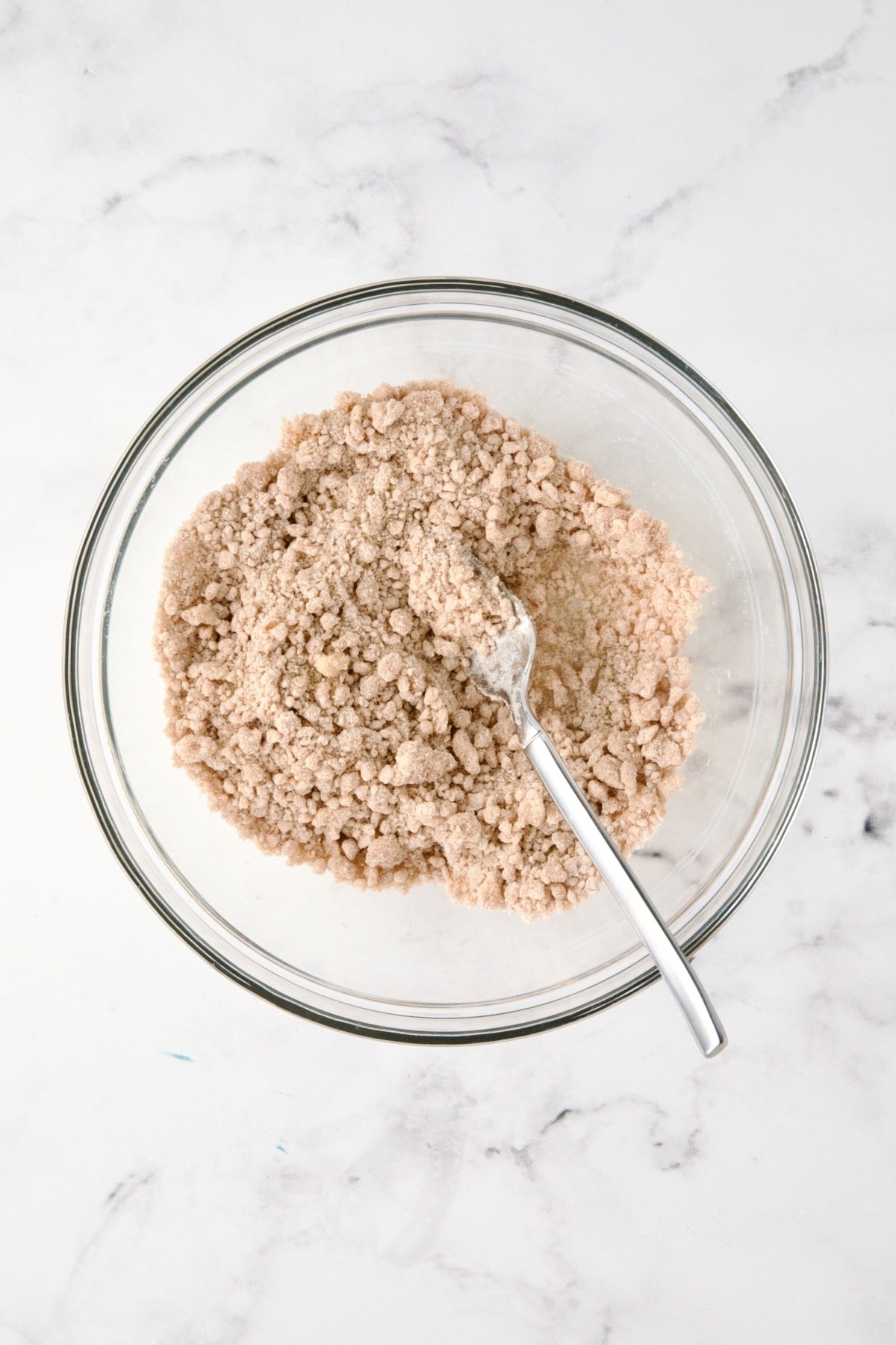 Streusel topping in glass bowl.