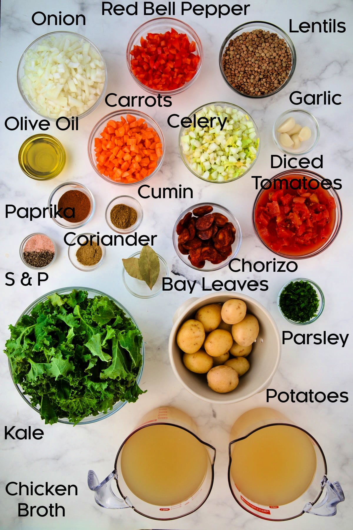 Ingredients for Spanish Lentil Potato Soup in glass bowls.