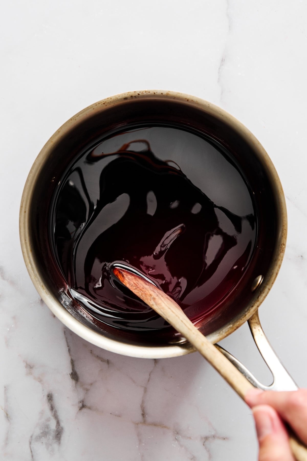 Reduced red wine sauce for pears.