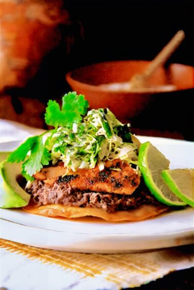 Salmon Tostadas on white plate.