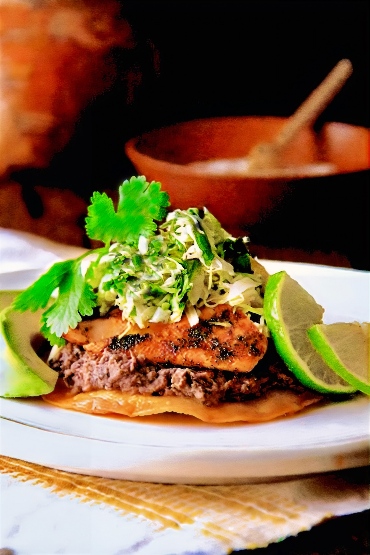 Salmon Tostadas on white plate.