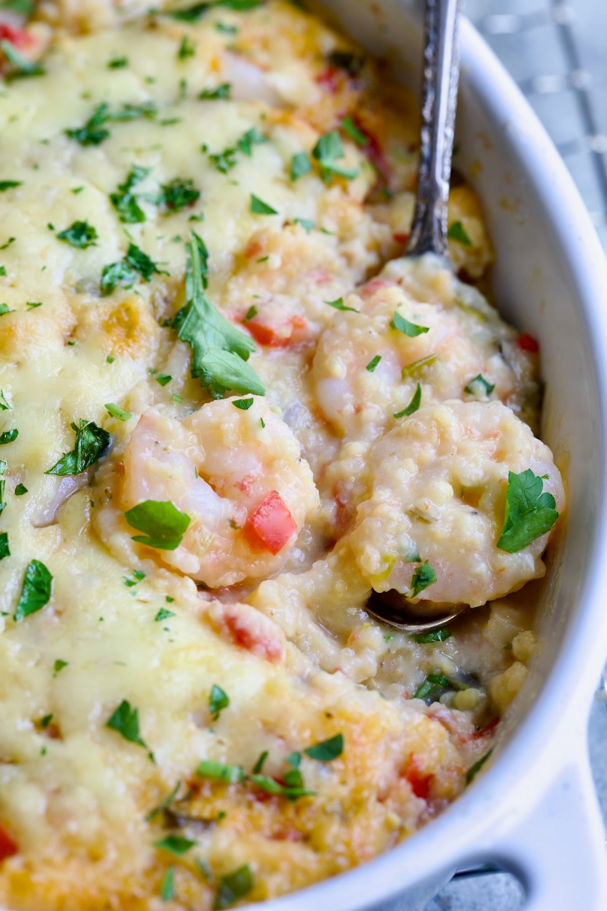 Shrimp and Grits Casserole in white Dutch oven.