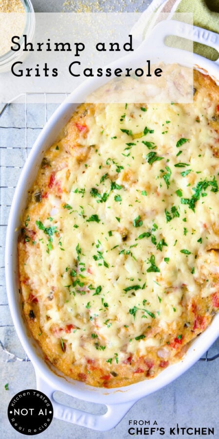 Pinterest graphic for Shrimp and Grits Casserole showing it whole in an oval white baking dish.