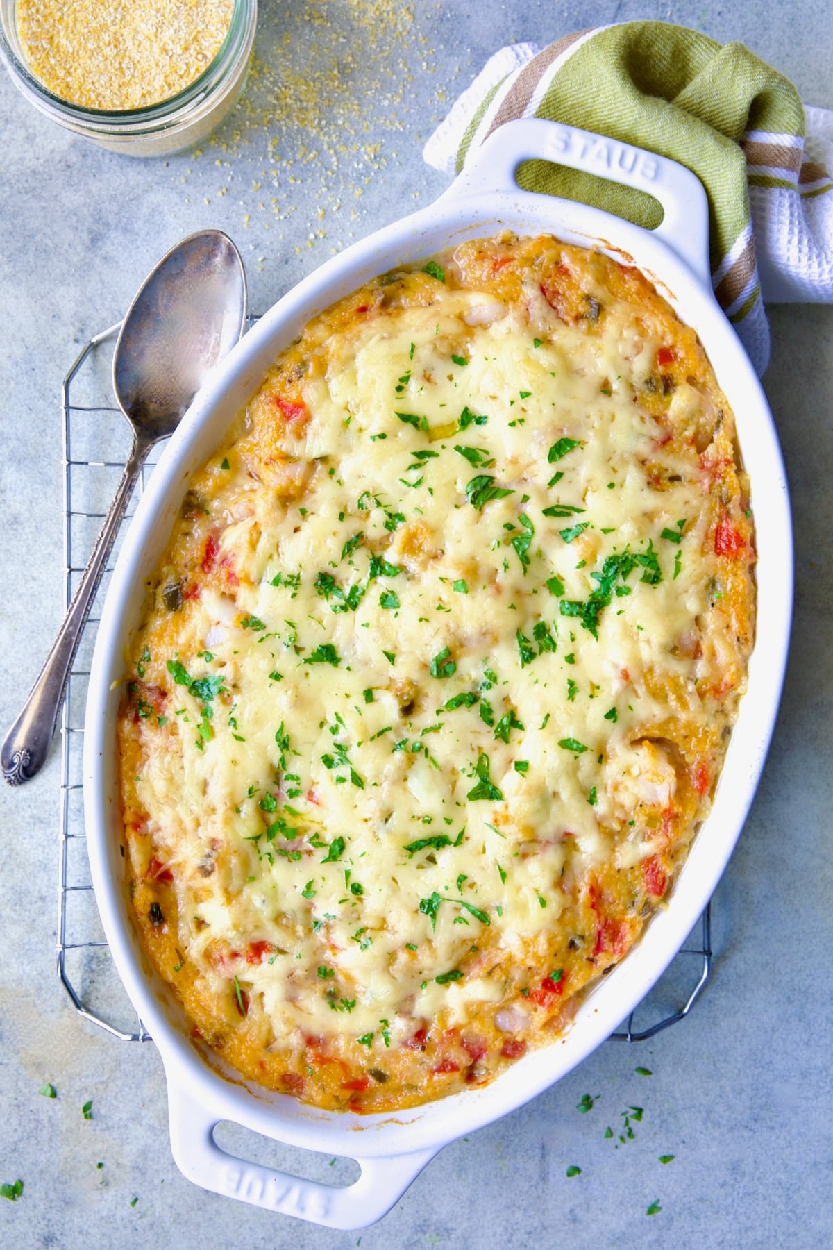 Shrimp and Grits Casserole in white Dutch oven.