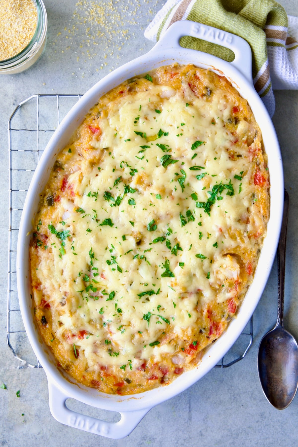Shrimp and Grits Casserole in white Dutch oven.