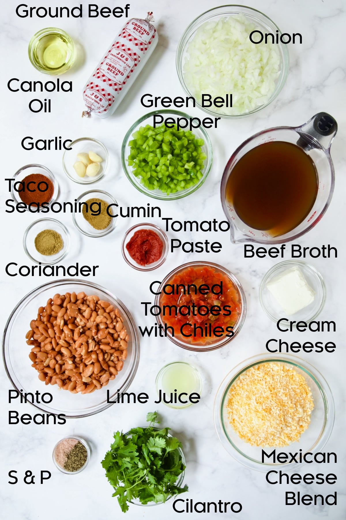 Ingredients for Creamy Taco Soup in glass bowls.